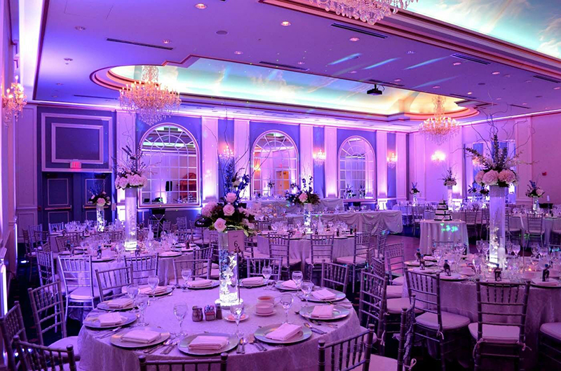 beautiful lilac uplighting at a wedding reception in Ohio